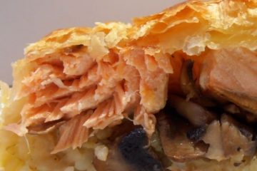 An image showing the 3 Layers Salmon Strudel, with the mushroom and rice visible, with a white background.