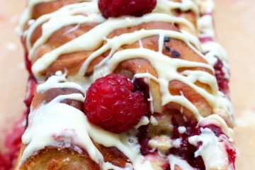 An image of Raspberry and White Chocolate Loaf Cake.