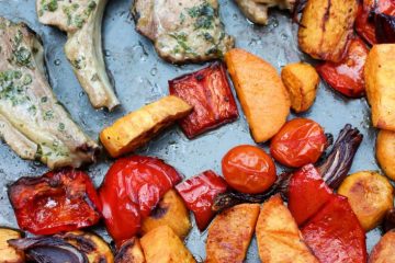 An image of Roast Lamb Cutlets with Vegetables and Herbs seen from the above.